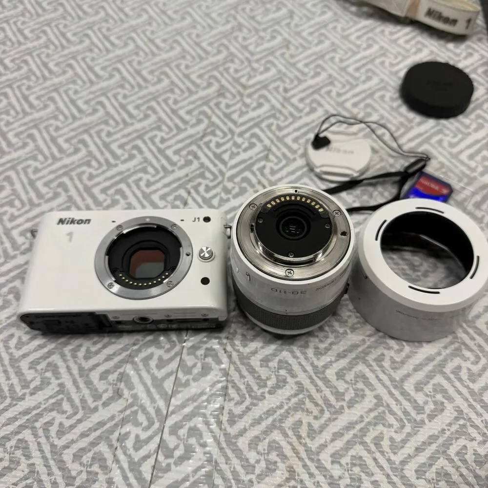 Nikon 1 J1 10.1MP White Camera Bundle - 10-30mm & 30-110mm VR Lenses SD Bag Case